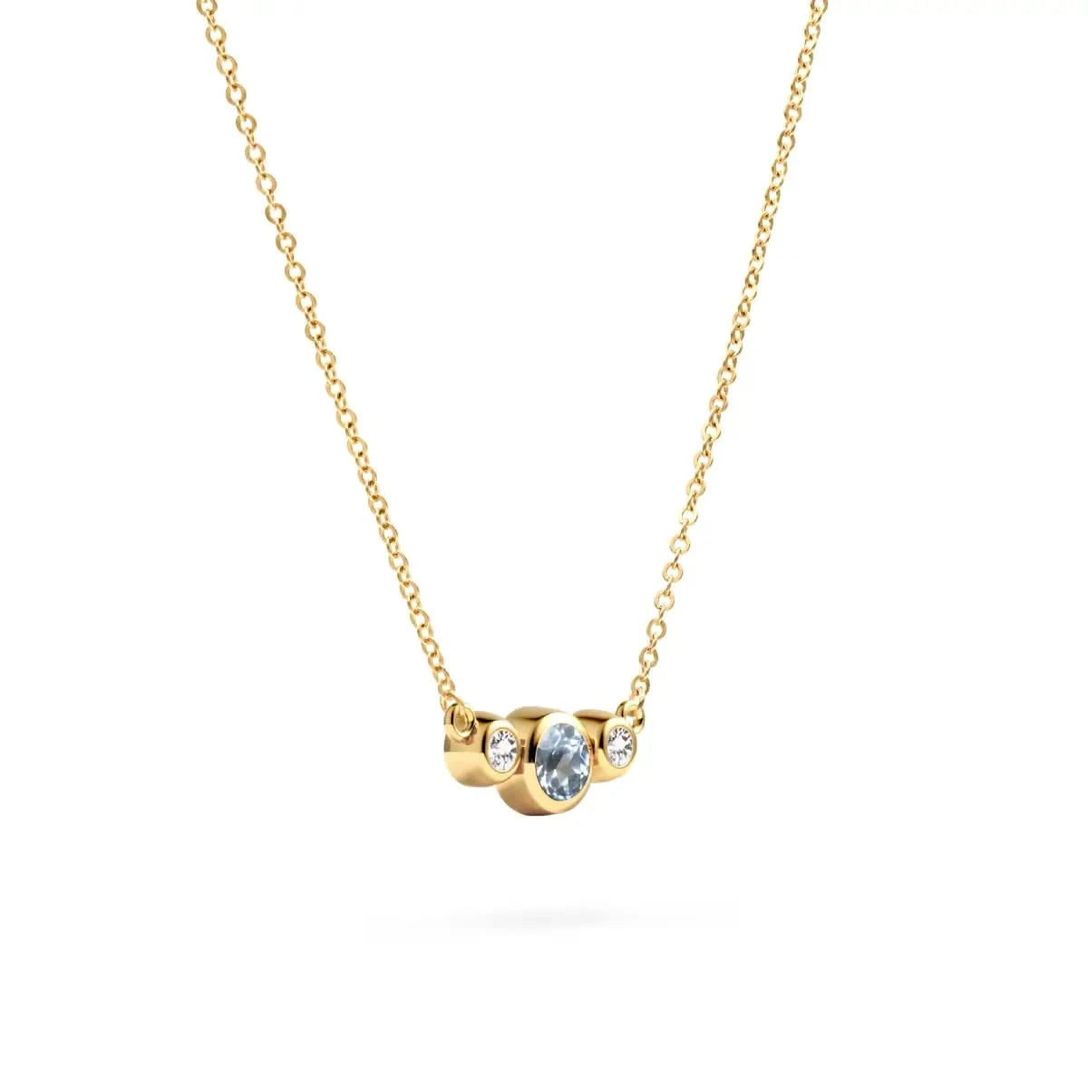 Barrington 3 Stone Necklace featuring a 4 mm round cut Aquamarine center stone framed by two 2 mm round cut Diamonds bezel set in 14k yellow gold on a saffron chain – angled view.