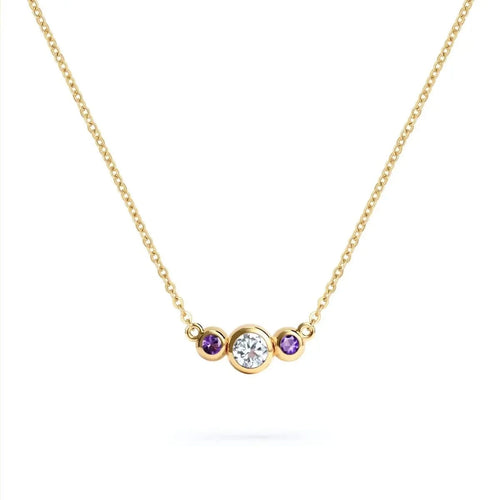 Barrington 3 Stone Necklace featuring a 4 mm round cut Diamond center stone framed by two 2 mm round cut Amethysts bezel set in 14k yellow gold on a saffron chain – front view.