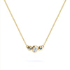 Barrington 3 Stone Necklace featuring a 4 mm round cut Diamond center stone framed by two 2 mm round cut Aquamarines bezel set in 14k yellow gold on a saffron chain – front view.