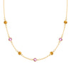 Sunset necklace featuring seven alternating 4 mm Pink Sapphires and Citrines bezel set in 14k yellow gold - front view