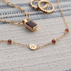 Personalized 1 Letter & 4 Classic Garnet Necklace in 14k Gold (January)