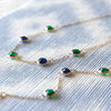 Terra 5 Stone necklace & Terra 3 Stone bracelet, each featuring alternating 4mm briolette cut emerald and sapphire gemstones.
