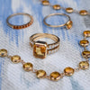 Warren ring with diamonds, Rosecliff Stackable ring, Grand ring, and Newport Grand necklace, all featuring citrine.