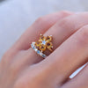 Stacked Greenwich Flower Citrine and Diamond ring with a Rosecliff Diamond & Nantucket Blue Topaz Stackable ring.