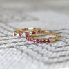 Two Rosecliff Pink Tourmaline Stackable rings, one with alternating diamonds, featuring eleven prong set gemstones.