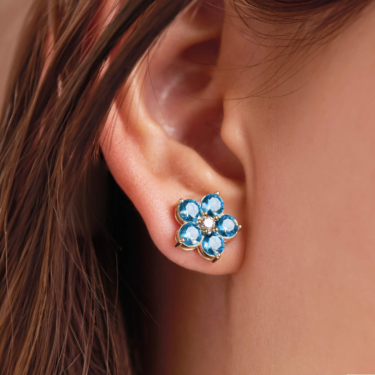 Blue topaz flower earrings deals