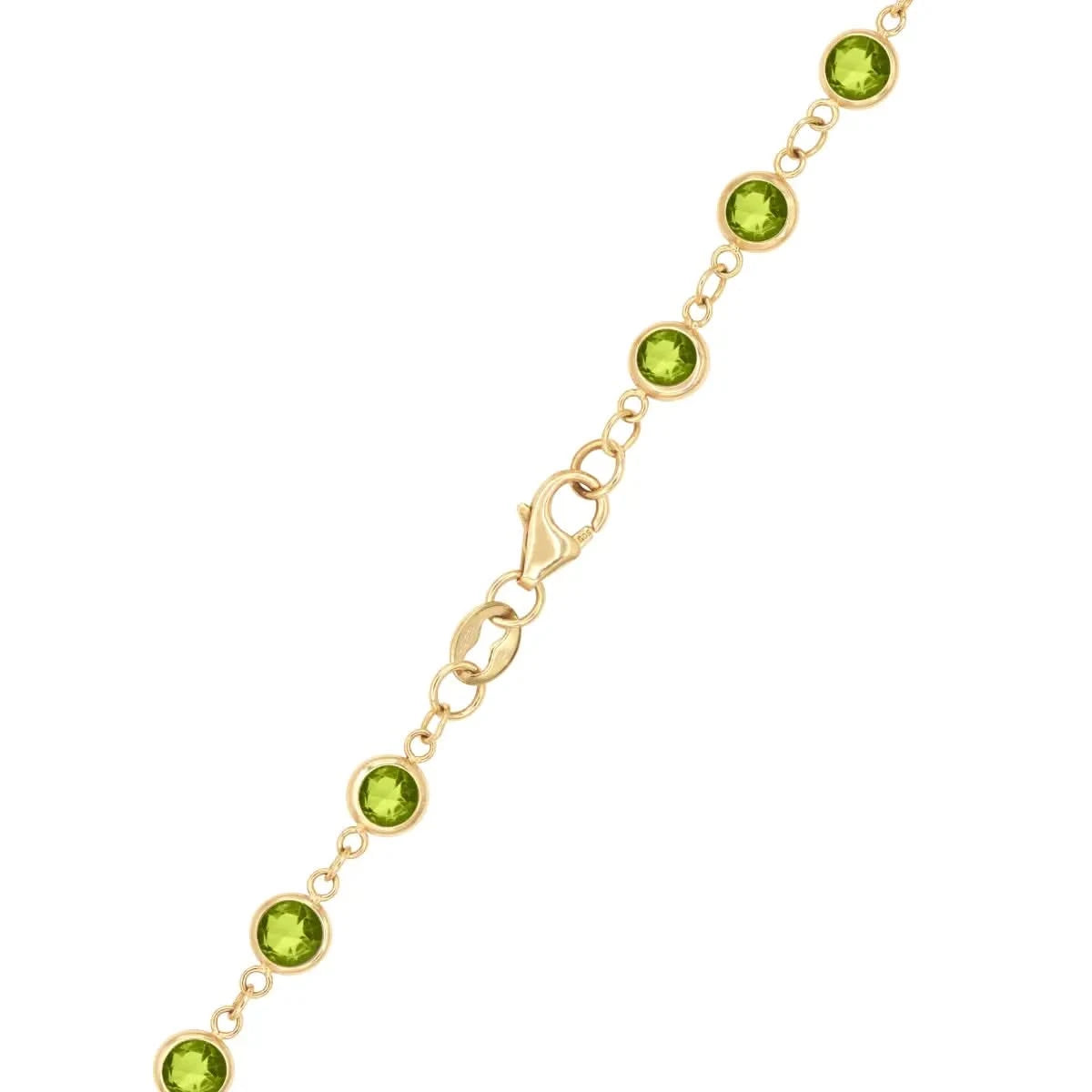 Close-up of the lobster clasp and bezel-set rubies on the Newport Peridot Long Necklace in 14k gold, honoring July birthdays.
