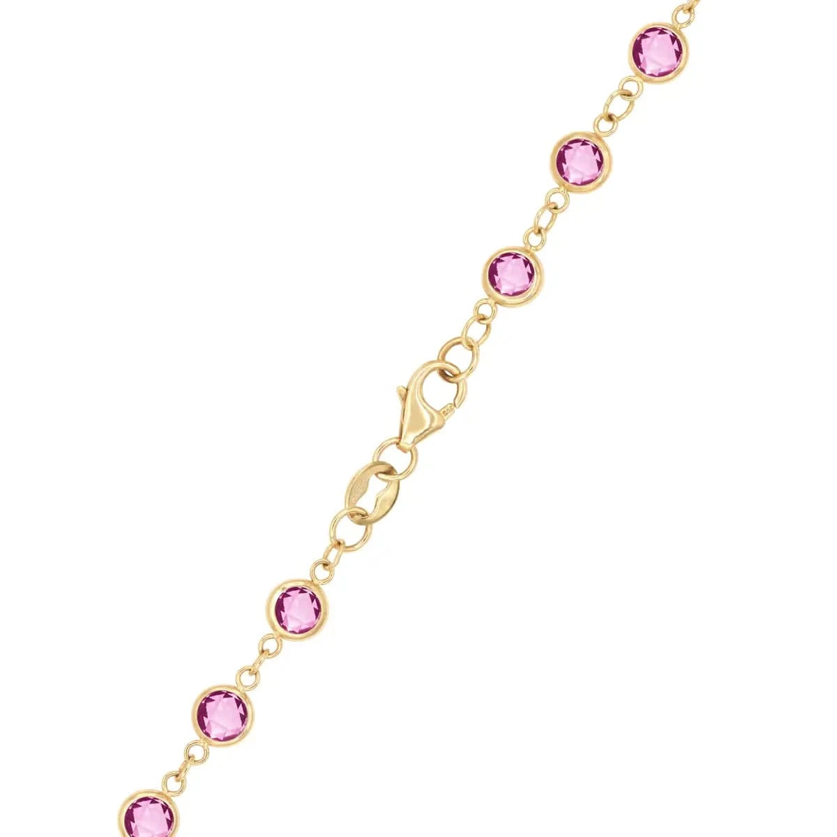 14k yellow gold 1.17 mm cable chain with a lobster claw clasp and 4 mm briolette cut bezel set Pink Sapphires.