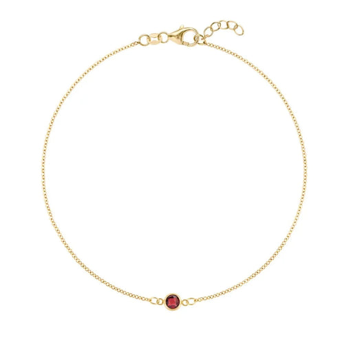 Classic cable chain bracelet featuring one 4 mm briolette cut garnet bezel set in 14k yellow gold - front view