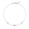 Pink Awareness Bracelet featuring two Moonstones and one Pink Sapphire bezel set in 14k white gold