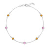Sunset bracelet featuring seven alternating 4 mm Pink Sapphires and Citrines bezel set in 14k white gold