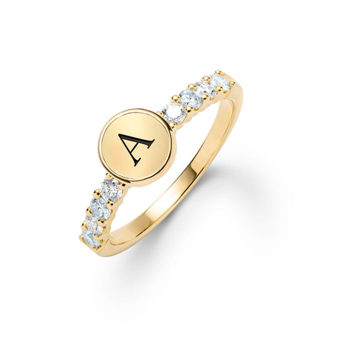 14k gold Rosecliff Letter, featuring a flat engraved letter disc nestled between alternating 2 mm faceted round cut, prong set Aquamarines and Diamonds - aspect view