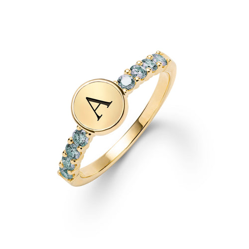 14k gold Rosecliff Letter Alexandrite Ring, featuring a letter disc nestled between 2 mm faceted round cut, prong set Alexandrites - aspect view
