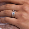 Hand with a Rosecliff Diamond & Sapphire Stackable Ring in 14k gold.