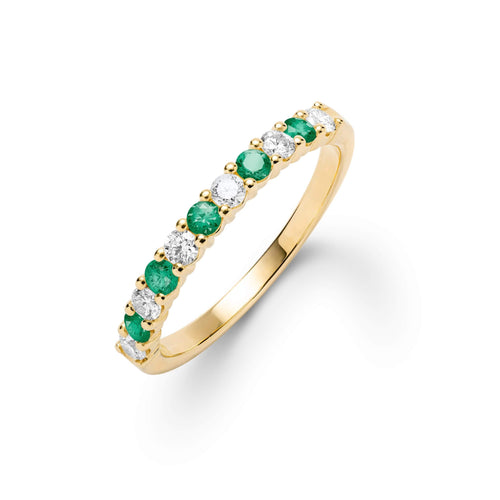 Rosecliff stackable ring featuring eleven alternating 2mm emeralds and diamonds prong set in 14k yellow gold - front view