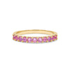 Rosecliff stackable ring featuring eleven 2 mm faceted round cut pink sapphires prong set in 14k yellow gold