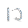 Rosecliff huggie earrings in 14k white gold each featuring nine 2mm faceted round cut prong set Nantucket blue topaz