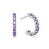 A pair of Rosecliff huggie earrings in 14k white gold featuring nine 2mm faceted round cut prong set amethysts