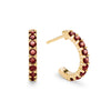 Rosecliff huggie earrings in 14k yellow gold each featuring nine 2mm faceted round cut prong set garnets - front view