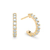 Rosecliff huggie earrings in 14k yellow gold featuring nine 2mm faceted round cut prong set aquamarines - front view