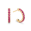 Two Rosecliff huggie earrings in 14k yellow gold each featuring nine 2mm faceted round cut prong set rubies - front view