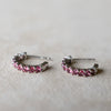 A pair of Rosecliff Pink Tourmaline earrings featuring nine 2mm faceted round cut gemstones, prong set in 14k white gold.
