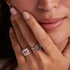 Woman's hand showcasing a Terra Rosecliff Small Circle Ring 14k gold with 12 emeralds and sapphires. 