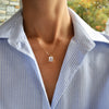 Rosecliff small circle necklace and an Adelaide paper clip chain with a Warren white topaz pendant in 14k yellow gold