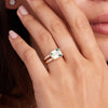 Woman showcasing a 14k yellow gold Warren Horizontal Green Amethyst Ring, featuring an emerald-cut 8 x 10mm Green Amethyst, hand-set horizontally in a 14k-gold bezel.