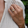 Woman showcasing a 14k yellow gold Warren Vertical Lemon Verbena Quartz Ring, featuring one 10 x 8 mm Lemon Verbena Quartz cut, bezel set.