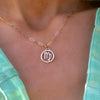 Woman wearing an Adelaide Mini necklace with 5.2x2mm paperclip links featuring a 12.5mm flat cutout Virgo symbol.