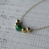 Bristol Bead Green Agate necklace featuring an 8mm center bead, & two 6mm gold beads on either side, on a 1.17mm cable chain.