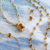 Assorted jewerly, including a pair of Stud earring featuring 6 mm briolette cut bezel set Citrine in a 14k yellow gold.