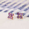 Pair of 14k yellow gold Greenwich 4 Birthstone earrings each featuring four 4 mm amethysts and one 2.1 mm diamond