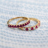 Two Rosecliff Ruby Stackable rings, both featuring eleven 2mm gemstones, and one with alternating diamonds.