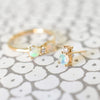 A Greenwich 2 Opal Birthstone & Diamond Ring and a single Greenwich Solitaire Opal earring, both in 14k yellow gold.