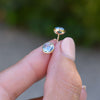 A pair of 14k yellow gold Grand stud earrings each featuring one 6 mm briolette cut Nantucket blue topaz