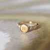 Personalized Rosecliff Letter Ring in 14k Gold, showcasing alternating 2 mm faceted round cut, prong set sustainable gemstones.