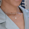 Video of Nantucket Blue Topaz necklace in 14k gold, showing gemstone sparkle and chain movement from different angles.