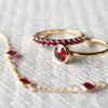 Rosecliff Stackable ring, Grand ring, and Bayberry 3 bracelet, all featuring sustainably grown rubies in 14k yellow gold.