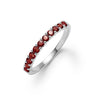 Rosecliff stackable ring featuring eleven 2 mm faceted round cut garnets prong set in 14k white gold
