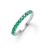 Rosecliff stackable ring featuring eleven 2 mm faceted round cut emeralds prong set in 14k white gold