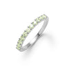 Rosecliff stackable ring featuring eleven 2 mm faceted round cut peridots prong set in 14k white gold
