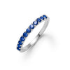 Rosecliff stackable ring featuring eleven 2 mm faceted round cut sapphires prong set in 14k white gold