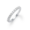 Rosecliff stackable ring in 14k white gold featuring eleven 2mm faceted round cut prong set white topaz