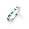 Rosecliff stackable ring featuring eleven alternating 2mm round cut emeralds and diamonds prong set in 14k white gold