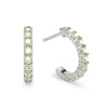 A pair of Rosecliff huggie earrings in 14k white gold each featuring nine 2mm faceted round cut prong set peridots