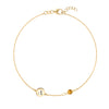 14k yellow gold Classic bracelet featuring one citrine and one 1/4” flat disc engraved with the letter A - front view