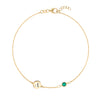 14k yellow gold Classic bracelet featuring one emerald and one 1/4” flat disc engraved with the letter A - front view