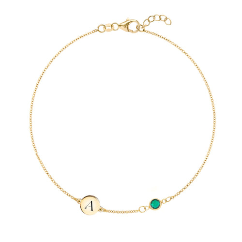 14k yellow gold Classic bracelet featuring one emerald and one 1/4” flat disc engraved with the letter A - front view
